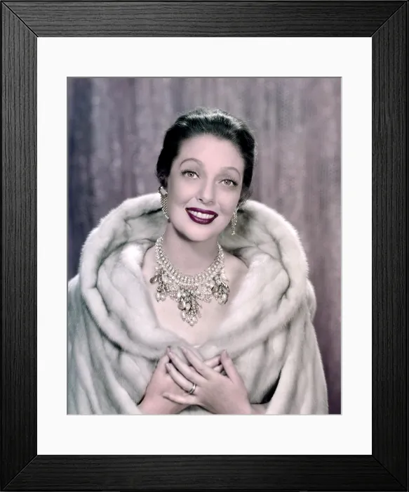 Framed Print : Loretta Young, modeling a crystal mink cape, 1961 Framed Print : Loretta Young, modeling a crystal mink cape, 1961