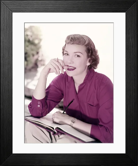 Framed Print : Jane Wyman, studying her script, a. mid-1950s