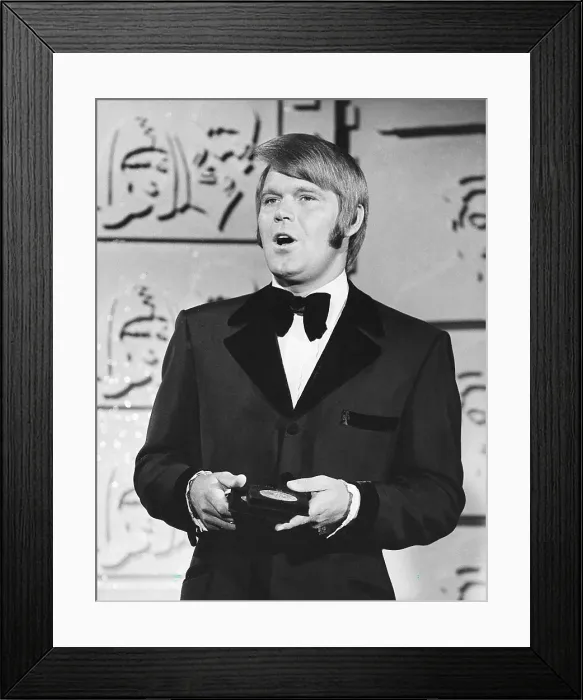 Framed Print : Glen Campbell, receiving CMA (aka Country Music Association) award, ca. late 1960s-early 1970s Framed Print : Glen Campbell, receiving CMA (aka Country Music Association) award, ca. late 1960s-early 1970s