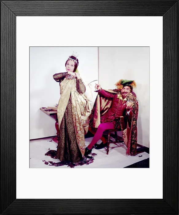 Framed Print : Ernie Kovacs (right), star of TAKE A GOOD LOOK, with wife Edie Adams (left), in a comedic photoshoot for TV Guide, 1960