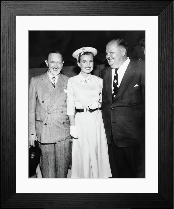 Framed Print : From left: Stan Laurel, Gale Storm, Oliver Hardy, during the dedication and naming of Lake Laurel and Hardy in the Hal Roach Studio, Echo Park, CA, December 1954
