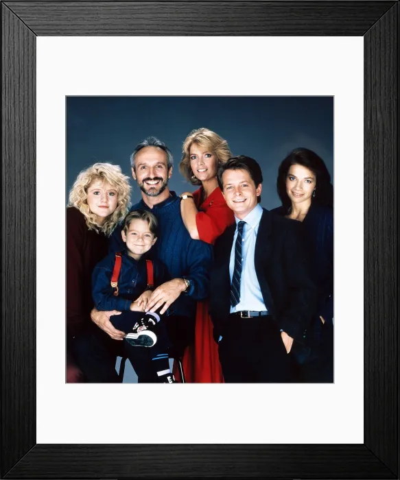 Framed Print : FAMILY TIES, from left: Tina Yothers, Brian Bonsall, Michael Gross, Meredith Baxter, Michael J. Fox, Justine Bateman, 1982-89