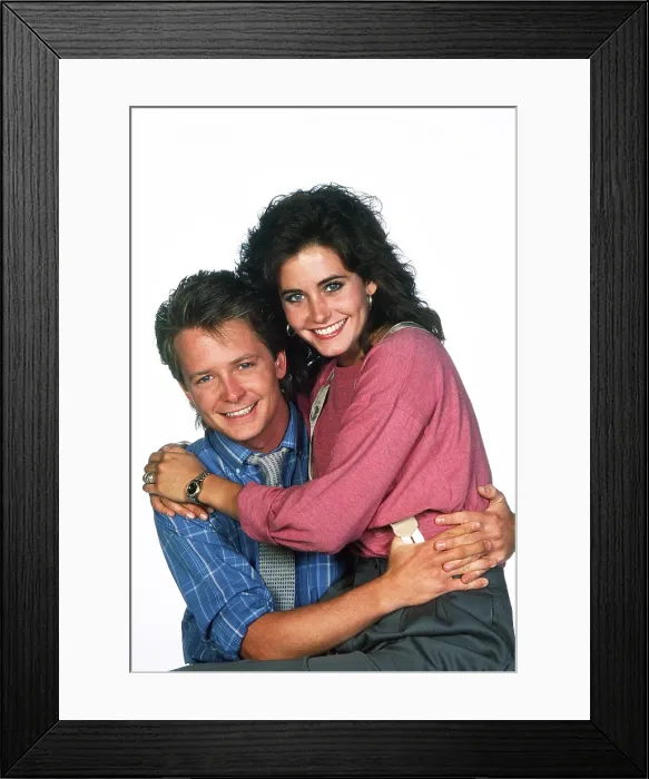 Framed Print : FAMILY TIES, from left: Michael J. Fox, Courteney Cox, (1987), 1982-89 Framed Print : FAMILY TIES, from left: Michael J. Fox, Courteney Cox, (1987), 1982-89