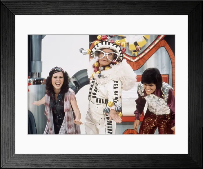 Framed Print : DONNY AND MARY, from left: Marie Osmond, Bob Hope (as Elton John), Donny Osmond, (Season 1, pilot episode, aired Novembe 16, 1975), 1975-1979 Framed Print : DONNY AND MARY, from left: Marie Osmond, Bob Hope (as Elton John), Donny Osmond, (Season 1, pilot episode, aired Novembe 16, 1975), 1975-1979