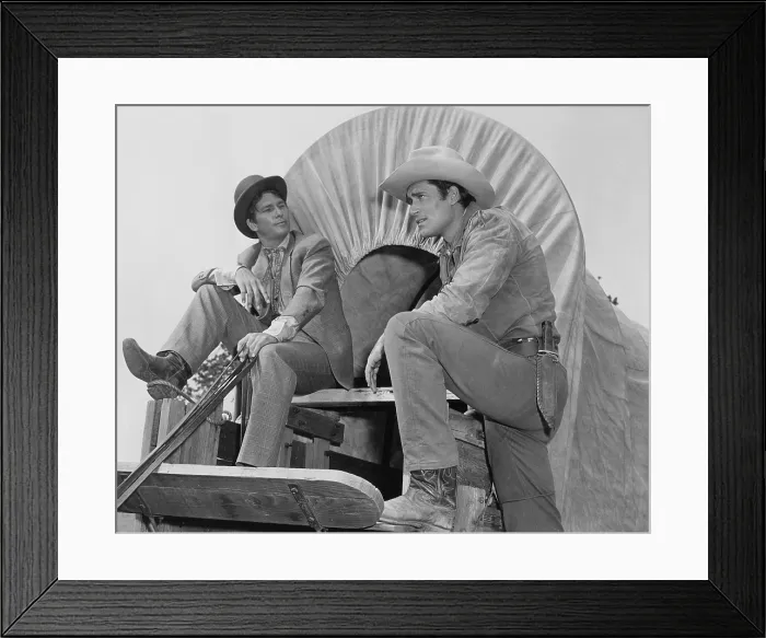 Framed Print : WARNER BROTHERS PRESENTS: CHEYENNE, from left: L.Q. Jones, Clint Walker, 1955-56