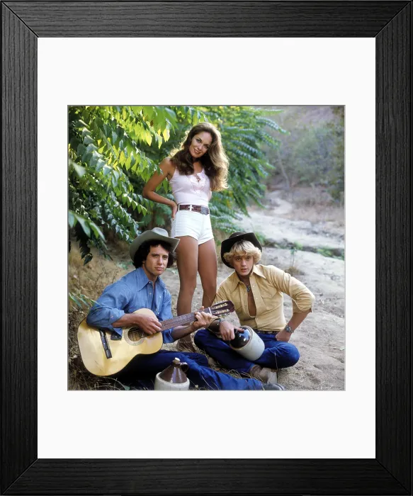 Framed Print : THE DUKES OF HAZZARD, Tom Wopat, Catherine Bach, John Schneider, 1979-1985 Framed Print : THE DUKES OF HAZZARD, Tom Wopat, Catherine Bach, John Schneider, 1979-1985