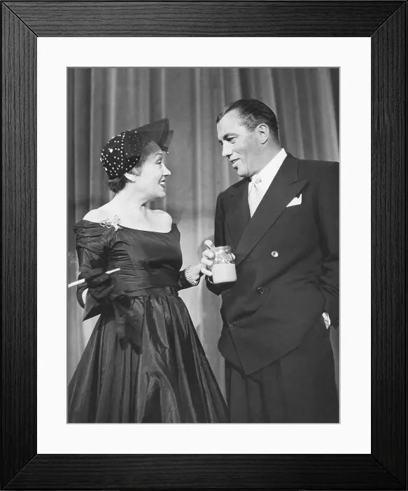 Framed Print : THE ED SULLIVAN SHOW, (aka TALK OF THE TOWN), from left: Gloria Swanson, Ed Sullivan, (circa 1950-1951), 1948-1971