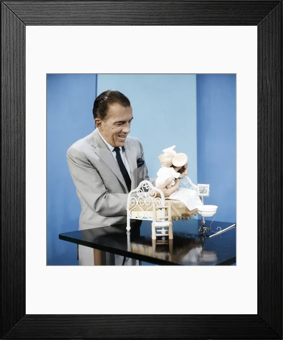 Framed Print : THE ED SULLIVAN SHOW, (aka TOAST OF THE TOWN), from left: Ed Sullivan (host), Topo Gigio, (1962-1969), 1948-1971