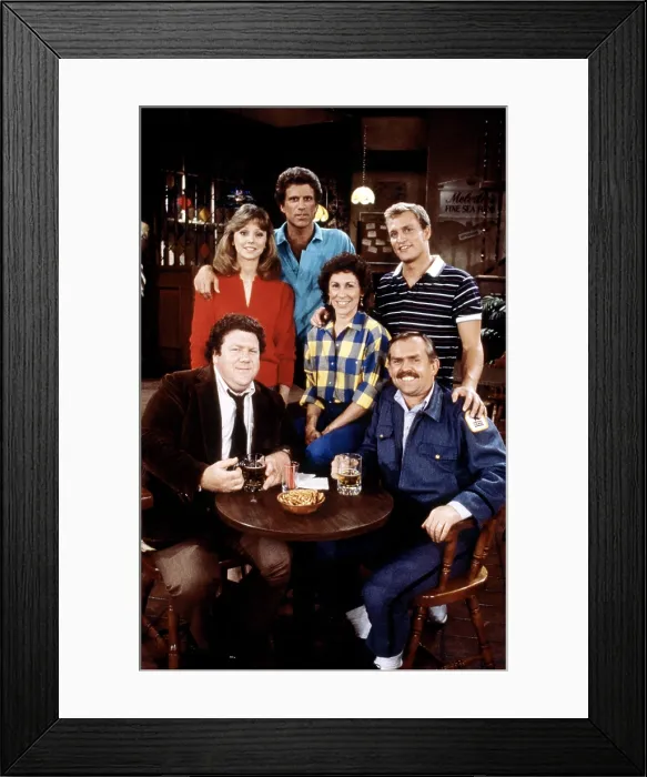 Framed Print : CHEERS, clockwise from top left, Shelley Long, Ted Danson, Rhea Perlman, Woody Harrelson, John Ratzenberger, George Wendt, 1982-93 (1985 photo)