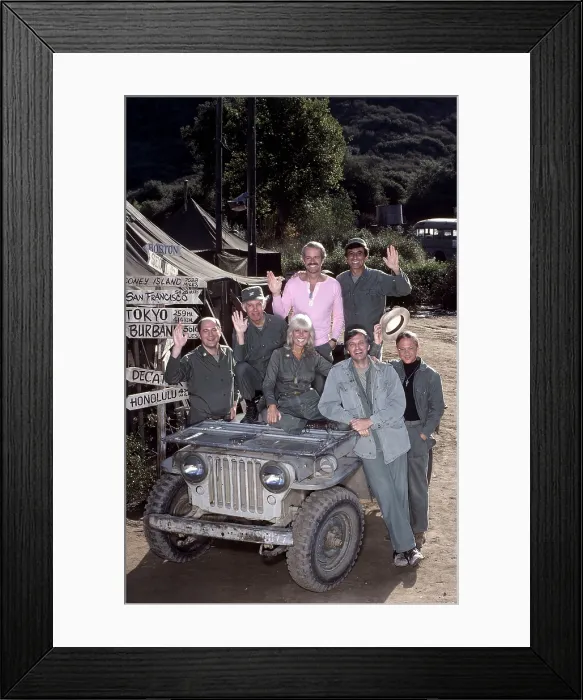 Framed Print : MASH, (aka M*A*S*H*), from left: David Ogden Stiers, Harry Morgan, Loretta Swit, Mike Farrell (pink), Alan Alda (front), Jamie Farr, William Christopher, (1982), 1972-1983 Framed Print : MASH, (aka M*A*S*H*), from left: David Ogden Stiers, Harry Morgan, Loretta Swit, Mike Farrell (pink), Alan Alda (front), Jamie Farr, William Christopher, (1982), 1972-1983