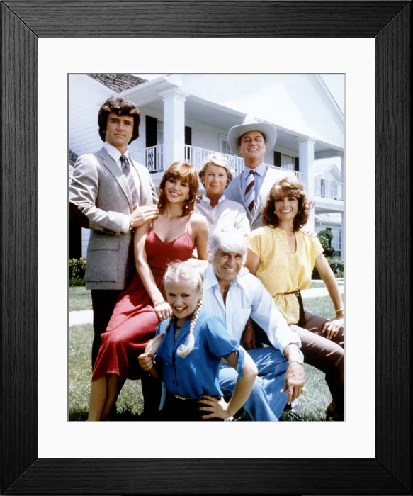 Framed Print : DALLAS, clockwise from upper left, Patrick Duffy, Victoria Principal, Barbara Bel Geddes, Larry Hagman, Linda Gray, Jim Davis, Charlene Tilton, 1978-91 (ca. 1980 photo)