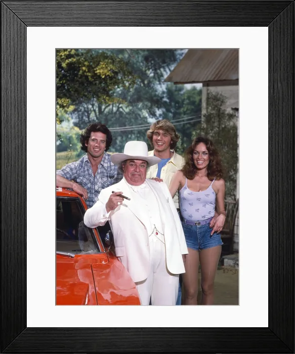 Framed Print : THE DUKES OF HAZZARD, from left, Tom Wopat, Sorrell Booke, John Schneider, Catherine Bach, 1979-85 Framed Print : THE DUKES OF HAZZARD, from left, Tom Wopat, Sorrell Booke, John Schneider, Catherine Bach, 1979-85