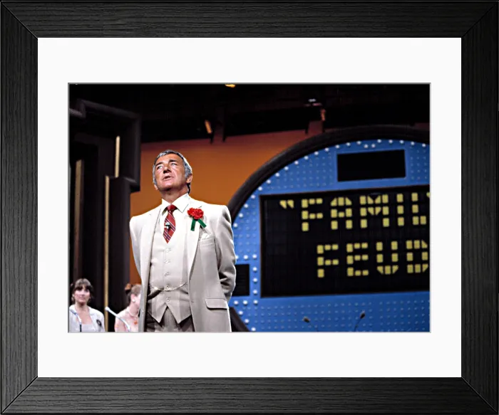Framed Print : FAMILY FEUD, 1976-85, Richard Dawson with two contestants, 1979 Framed Print : FAMILY FEUD, 1976-85, Richard Dawson with two contestants, 1979