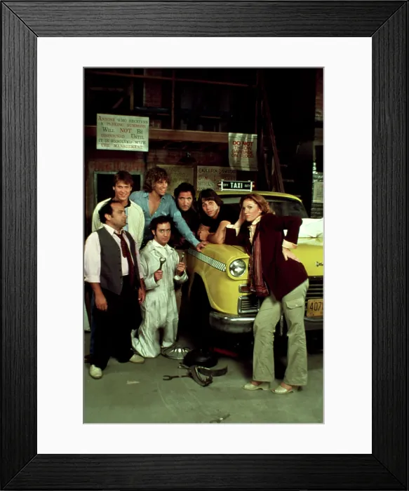 Framed Print : TAXI, (front) D. DeVito, A. Kaufman, M. Henner, (back), R. Carver, J. Conaway, J Hirsch, T. Danza, 1978-83 Framed Print : TAXI, (front) D. DeVito, A. Kaufman, M. Henner, (back), R. Carver, J. Conaway, J Hirsch, T. Danza, 1978-83