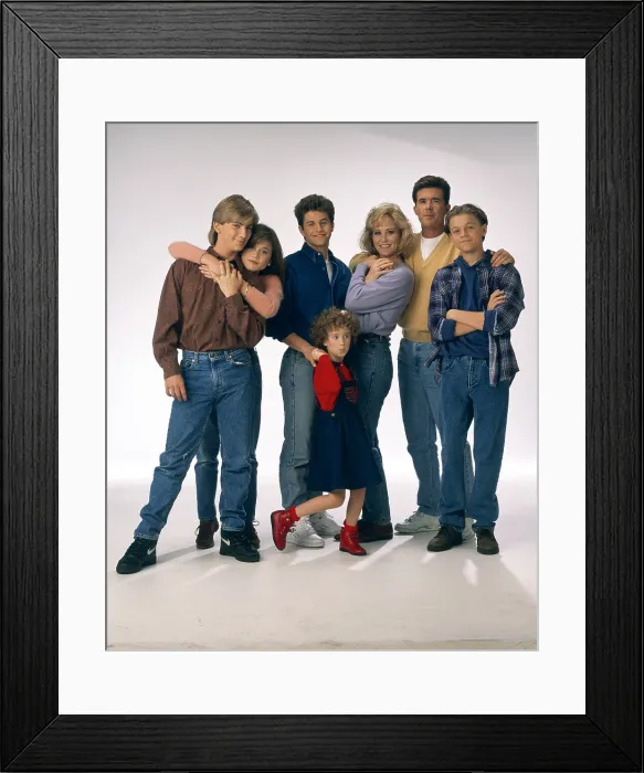 Framed Print : GROWING PAINS, back row: Jeremy Miller, Tracey Gold, Kirk Cameron, Joanna Kerns, Alan Thicke, Leonardo DiCaprio, front row: Ashley Johnson, 1985-1992