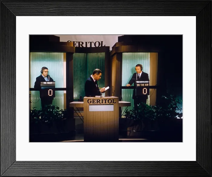 Framed Print : TWENTY-ONE, (aka 21), from left: contestant Mr. Seley (first name unknown), host Jack Barry, contestant Hank Bloomgarden, (1957), 1956-1958