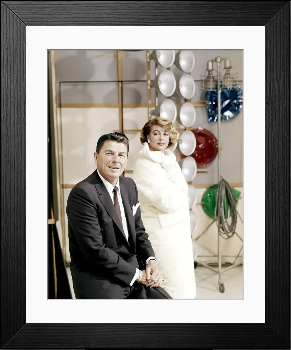 Framed Print : GENERAL ELECTRIC THEATER, from left, host Ronald Reagan, guest star Dorothy Malone, The Clown, aired March 27, 1955 Framed Print : GENERAL ELECTRIC THEATER, from left, host Ronald Reagan, guest star Dorothy Malone, The Clown, aired March 27, 1955