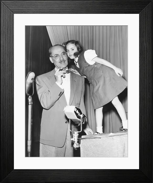 Framed Print : YOU BET YOUR LIFE, from left: Groucho Marx (host), Melinda Marx (daughter), (1953), 1951-1961 Framed Print : YOU BET YOUR LIFE, from left: Groucho Marx (host), Melinda Marx (daughter), (1953), 1951-1961