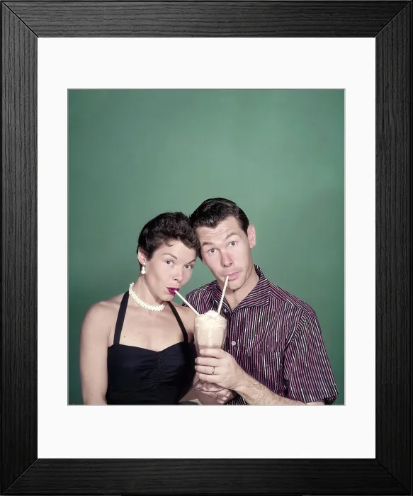 Framed Print : Johnny Carson (right), host of THE JOHNNY CARSON SHOW, and his wife Jody Carson (aka Joan Carson), 1955