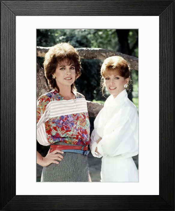 Framed Print : DALLAS, from left, Linda Gray, Victoria Principal, 1978-91 (1983 photo) Framed Print : DALLAS, from left, Linda Gray, Victoria Principal, 1978-91 (1983 photo)