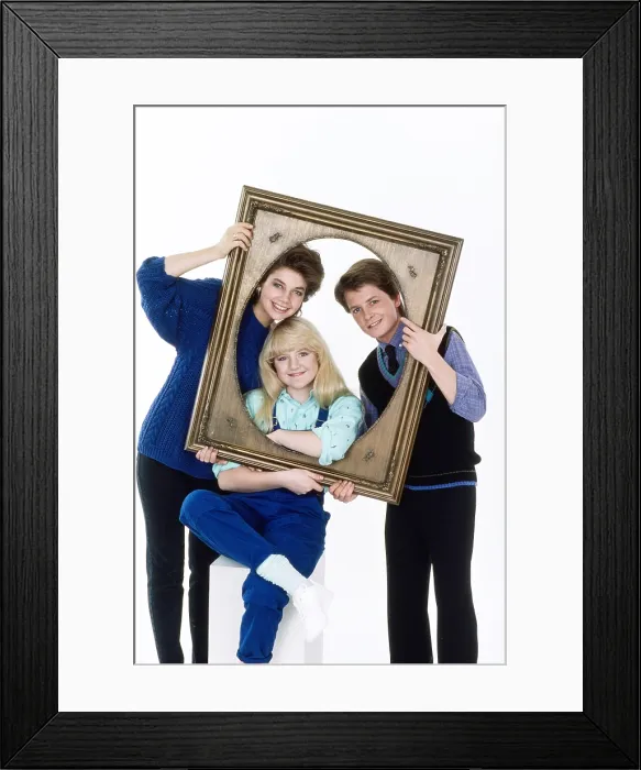 Framed Print : FAMILY TIES, from left, Justine Bateman, Tina Yothers, Michael J. Fox, 1982-89 (1985 photo)