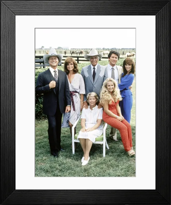 Framed Print : DALLAS, clockwise from upper left, Larry Hagman, Linda Gray, Jim Davis, Patrick Duffy, Victoria Principal, Charlene Tilton, Barbara Bel Geddes, 1978-91 (ca. early 1980s photo)