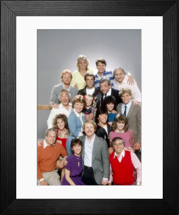 Framed Print : HAPPY DAYS, cast at series finale includes Don Most, Henry Winkler, Anson Williams, Pat Morita, Al Molinaro, Marion Ross, Heather O'Rourke, Erin Moran, Tom Bosley, Ted McGinley