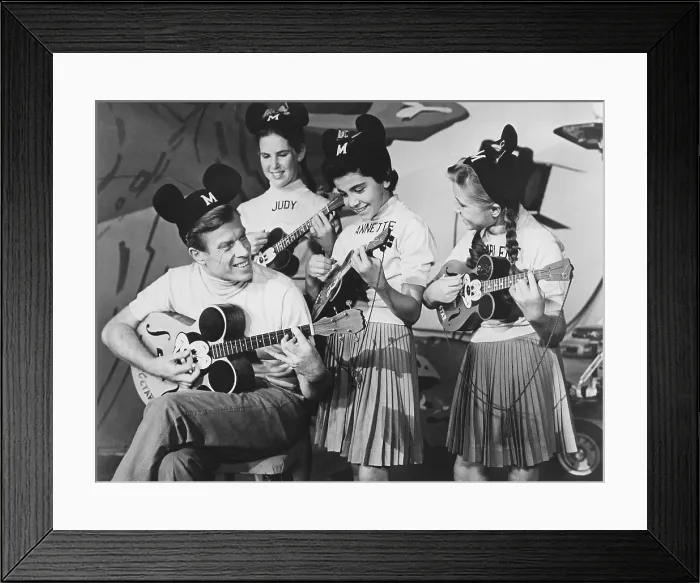 Framed Print : THE MICKEY MOUSE CLUB, from left: Jimmie Dodd, Judy Harriet, Annette Funicello, Doreen Tracey, playing the ukulele, 1955-1959 Framed Print : THE MICKEY MOUSE CLUB, from left: Jimmie Dodd, Judy Harriet, Annette Funicello, Doreen Tracey, playing the ukulele, 1955-1959