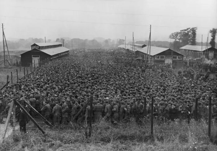 Framed Print : 10, 000 German prisoners of war line up for lunch at an enclosure in France. The POWs were captured in the 1944 Allied drive through France, during World War 2. (BSLOC_2013_14_288) Framed Print : 10, 000 German prisoners of war line up for lunch at an enclosure in France. The POWs were captured in the 1944 Allied drive through France, during World War 2. (BSLOC_2013_14_288)