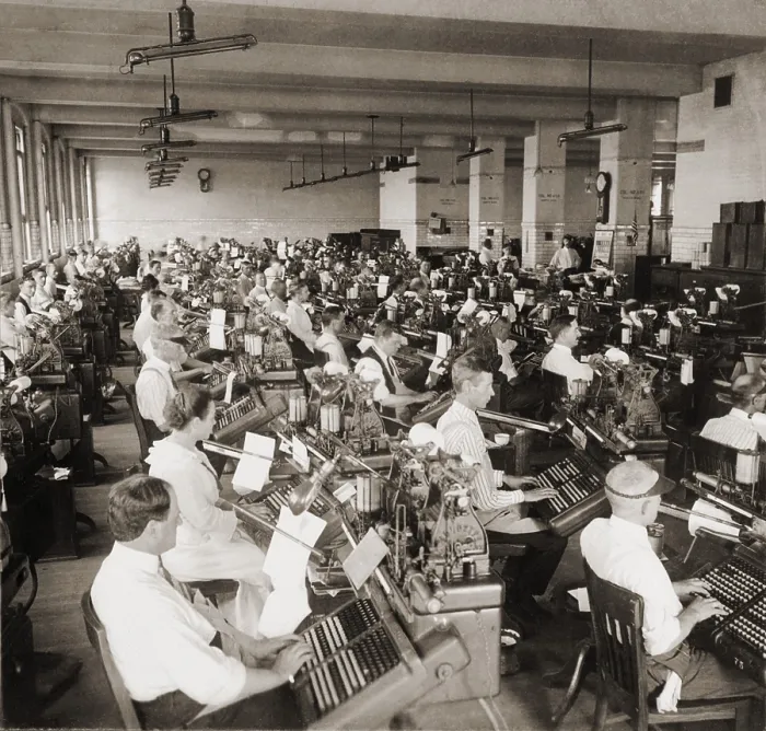 Framed Print : 100 workers setting type on monotype machines, each with a 120-key keyboard. At the U.S government's Bureau of Printing and Engraving. 1917