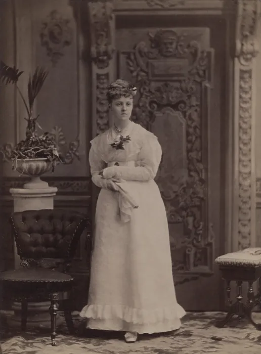 Framed Print : 16-year-old Edith Newbold Jones (later Edith Wharton) wears a formal dress, with her hair put up. She is photographed in a highly decorated gilded age interior in 1876 Framed Print : 16-year-old Edith Newbold Jones (later Edith Wharton) wears a formal dress, with her hair put up. She is photographed in a highly decorated gilded age interior in 1876