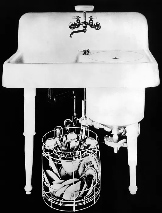 Framed Print : 1920s Electric Dishwashersink. It had a heavy, enameled, cast-iron tub attached to a sink by U bolts and a rubber gasket Framed Print : 1920s Electric Dishwashersink. It had a heavy, enameled, cast-iron tub attached to a sink by U bolts and a rubber gasket