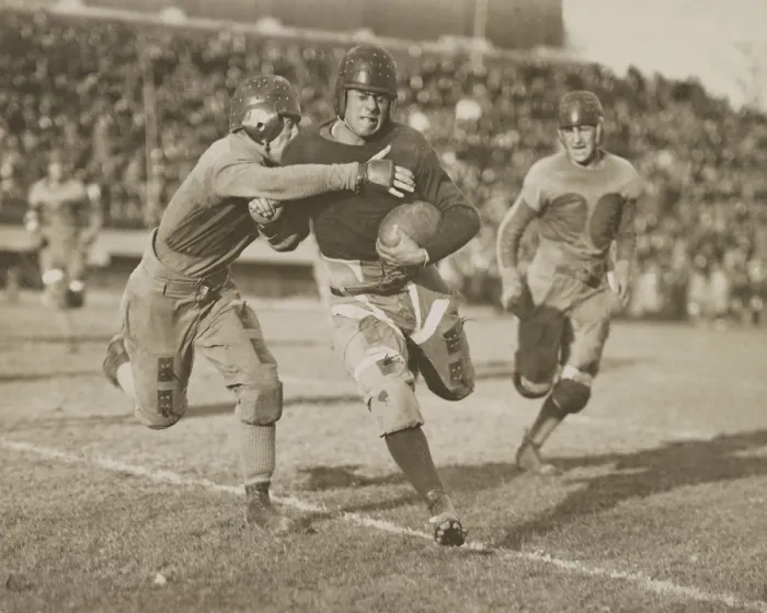 Framed Print : 1920s football action. Hundreds of spectators watch from stadium seats. (BSLOC_2015_17_124) Framed Print : 1920s football action. Hundreds of spectators watch from stadium seats. (BSLOC_2015_17_124)