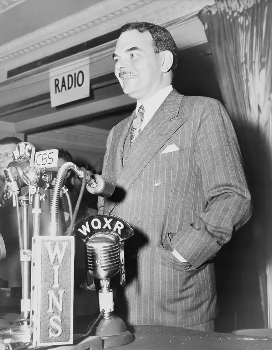 Framed Print : 1948 Republican Presidential candidate, Thomas E. Dewey (1902-1971), before microphones at a press conference in New York, following his upset loss to President Truman. 1948