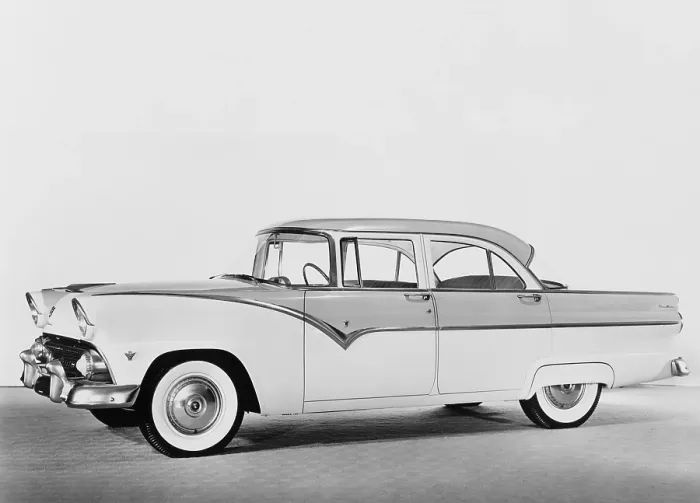 Framed Print : 1955 Ford four-door sedan featured two-tone paint, heavy chrome detail, white wall tires, wrap around windshield, and a hint of tail fins Framed Print : 1955 Ford four-door sedan featured two-tone paint, heavy chrome detail, white wall tires, wrap around windshield, and a hint of tail fins