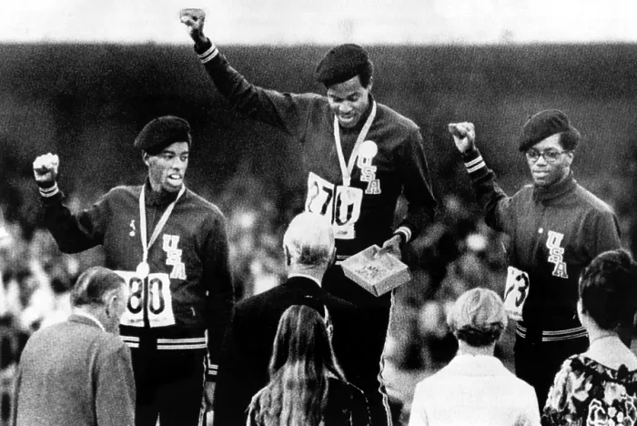 Framed Print : 1968 Olympics, 400 Meter Run winners Larry James, Lee Evans, Ron Freeman give Black Power salute upon receiving Gold Medals, Mexico City, Mexico, 10-18-1968 Framed Print : 1968 Olympics, 400 Meter Run winners Larry James, Lee Evans, Ron Freeman give Black Power salute upon receiving Gold Medals, Mexico City, Mexico, 10-18-1968