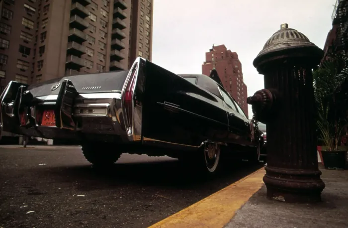 Framed Print : 1970s America. A Cadillac Fleetwood parked illegally in a fire lane. Manhattan, New York City, ca. 1973