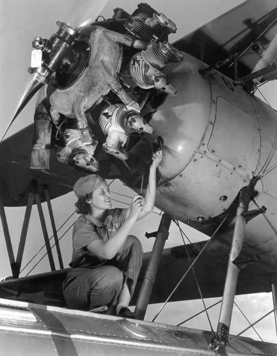 Framed Print : 20 year old women and expert aviation mechanic working on a Wright Whirlwind airplane motor. She rebuilt the engine at a Naval Air Base, Oct. 1942. (BSLOC_2013_14_110) Framed Print : 20 year old women and expert aviation mechanic working on a Wright Whirlwind airplane motor. She rebuilt the engine at a Naval Air Base, Oct. 1942. (BSLOC_2013_14_110)