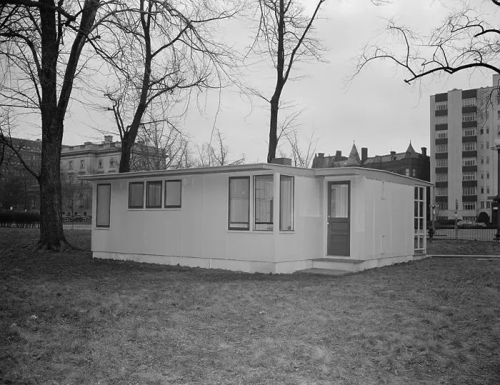 Framed Print : 30, 000 prefabricated house to be shipped to Great Britain under lend-lease in 1945. The house has a kitchen entrance (facing camera) and front entrance