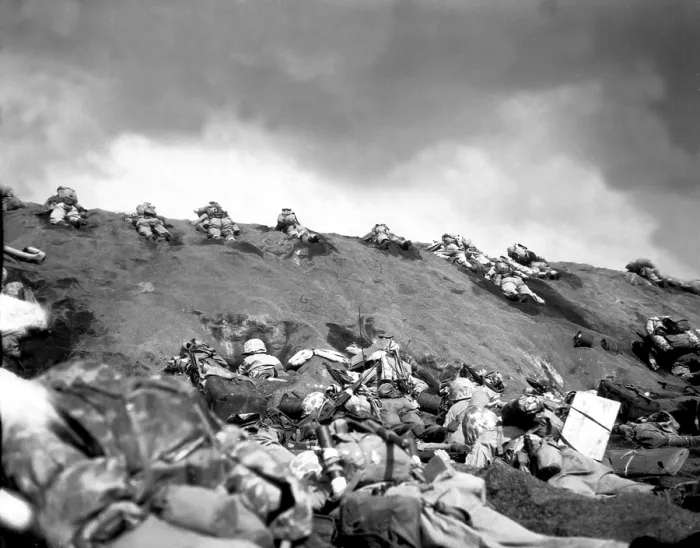 Framed Print : 5th Division Marines crawl up a slope on Red Beach No. 1 toward Mt. Suribachi on Iwo Jima. Feb. 19, 1945. World War 2. (BSLOC_2013_13_52)