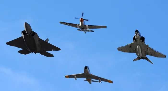 Framed Print : 70 years of Air Force fighters fly in formation. From left clockwise F-22 Raptor aircraft P-51 Mustang propeller fighter F-4 Phantom jet F-86 Sabre jet. (BSLOC_2011_12_226) Framed Print : 70 years of Air Force fighters fly in formation. From left clockwise F-22 Raptor aircraft P-51 Mustang propeller fighter F-4 Phantom jet F-86 Sabre jet. (BSLOC_2011_12_226)