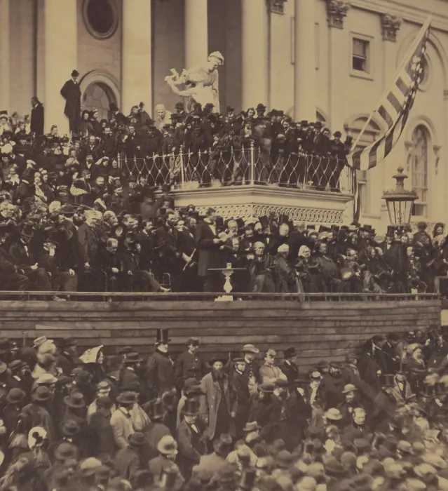 Framed Print : Abraham Lincoln delivering his second inaugural address on March 4, 1865. Lincoln stands in the center of the photo (below the flag and to the left), on the east front of the U.S