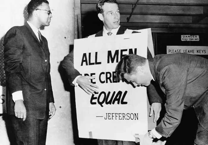 Framed Print : Actor Charlton Heston adjusts a sandwich board for a civil rights demonstration. Oklahoma City, May 27, 1961. His sign reads, All Men are Created Equal. (CSU_2015_9_963) Framed Print : Actor Charlton Heston adjusts a sandwich board for a civil rights demonstration. Oklahoma City, May 27, 1961. His sign reads, All Men are Created Equal. (CSU_2015_9_963)