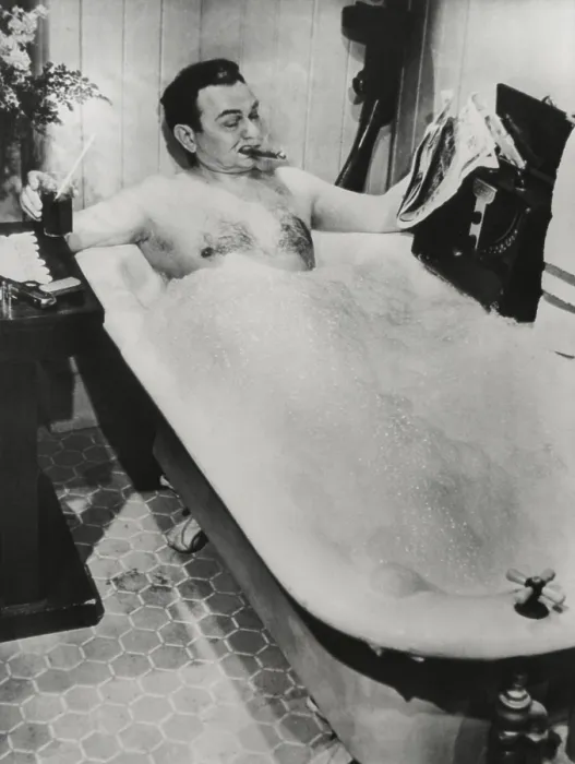 Framed Print : Actor Edward G. Robinson, in a bubble bath with his cigar, drink, and a newspaper. It is a movie still for a 1948 film. - (BSLOC_2014_17_90)