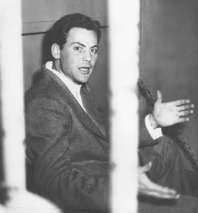 Framed Print : Actor John Agar, protests photographers taking his picture after his drunk driving arrest. Feb. 12, 1950. The 29 year old actor was recently divorced from Shirley Temple