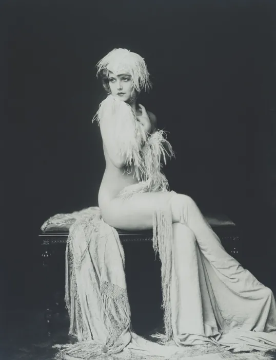 Framed Print : Actress and Ziegfeld girl Claudia Dell. Full length portrait of Dell nude and draped in feathers and cloth Framed Print : Actress and Ziegfeld girl Claudia Dell. Full length portrait of Dell nude and draped in feathers and cloth