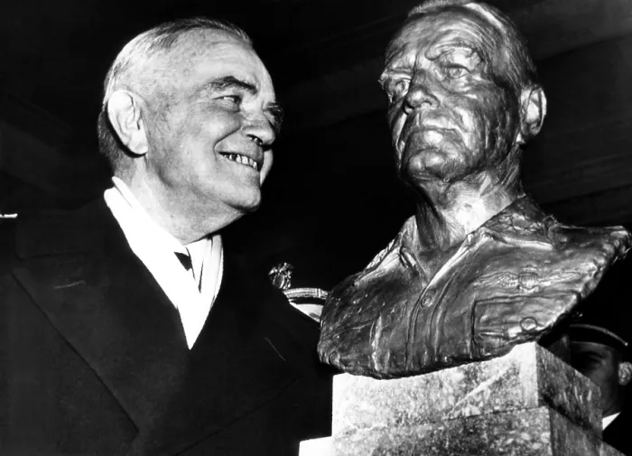Framed Print : Admiral William F. Halsey looks over a bust of himself during Halsey Day ceremonies at the US Naval Acadey in Annapolis, Maryland. December 14, 1947