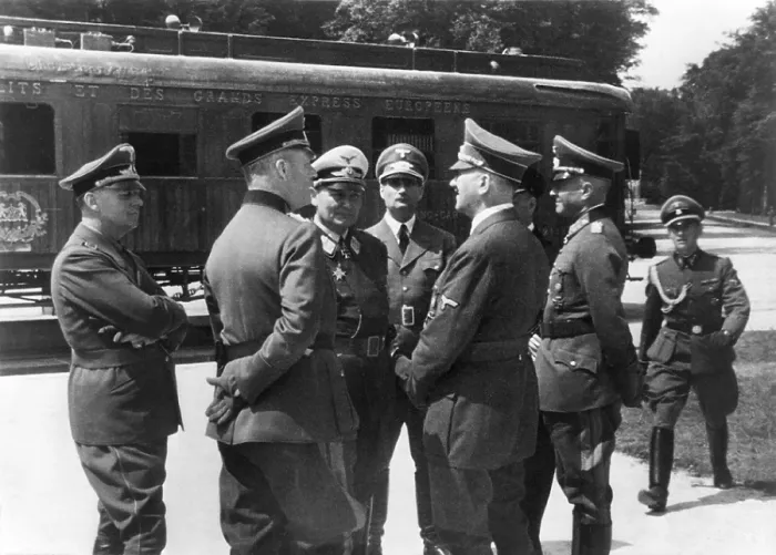 Framed Print : Adolf Hitler in Compiegne, France. He speaks with German generals in front of same train carriage in which the 1918 World War 1 Armistice had been signed Framed Print : Adolf Hitler in Compiegne, France. He speaks with German generals in front of same train carriage in which the 1918 World War 1 Armistice had been signed