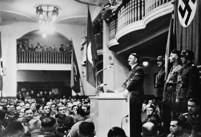 Framed Print : Adolf Hitler giving his annual speech to his old guard at the Munich beer hall, Nov. 8, 1939. Minutes after Hitler left, a bomb planted in the lectern exploded. Nov