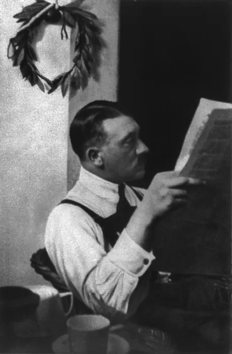 Framed Print : Adolf Hitler reading newspaper in Landsberg prison, 1924. He served nine months for his role in an attempted a coup d'tat in Munich, known as the Beer Hall Putsch in 1923